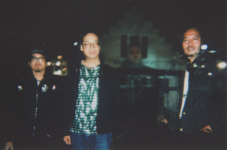 MANAs stands together in a blurred image