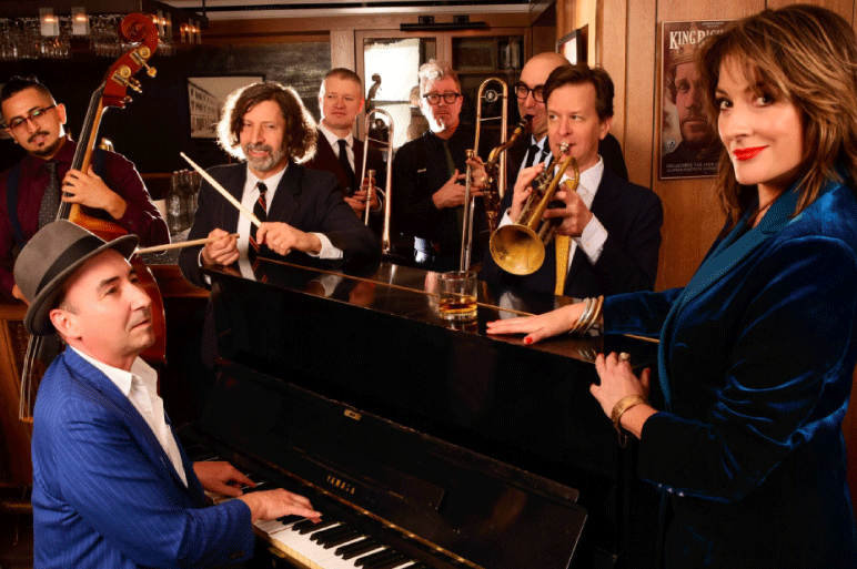 The Hot Sardines pose with their instruments